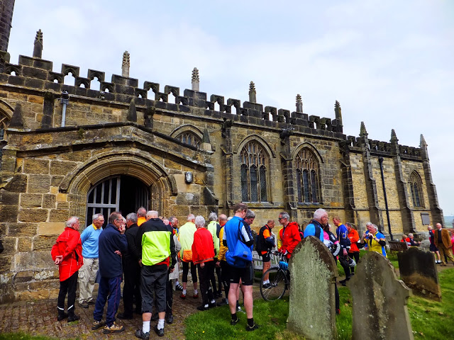 Cyclists gather outside St Michael’s Church in Coxwold, North Yorkshire, before a Service of Remembrance which has taken place annually since the 1920s. This year’s service is on the 8th May. Photo: Graeme Holdsworth (Twitter: @balancingonmy_).